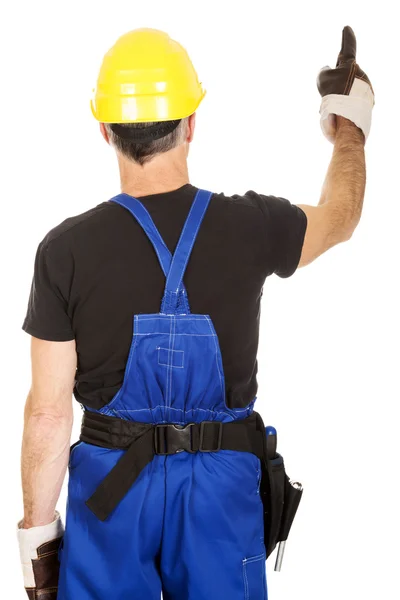 Back view repairman pointing up — Stock Photo, Image