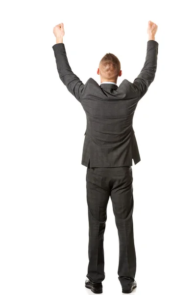 Joven hombre de negocios celebrando su éxito empresarial — Foto de Stock