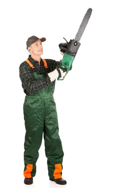 Adult sawyer with chainsaw — Stock Photo, Image