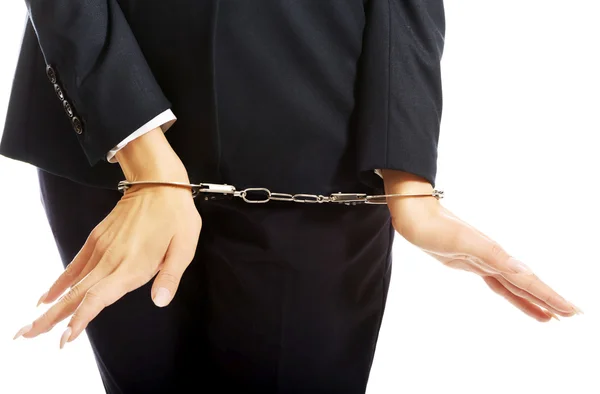 Close up on businesswoman with handcuffs — Stock Photo, Image