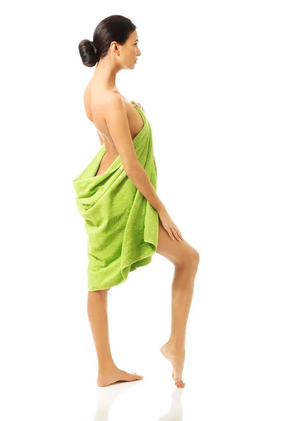 Full length back view woman wrapped in towel — Stock Photo, Image