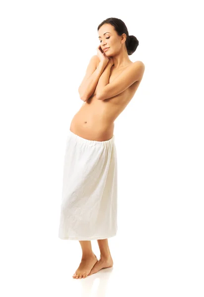 Full length of a woman wrapped in towel — Stock Photo, Image