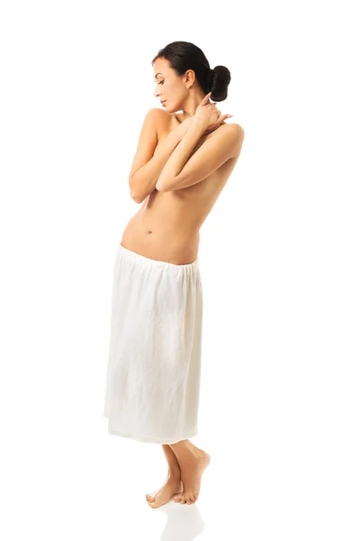 Full length of a woman wrapped in towel — Stock Photo, Image