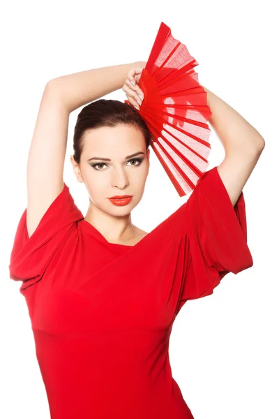 Передній вигляд латиноамериканської танцівниці в червоній сукні — стокове фото