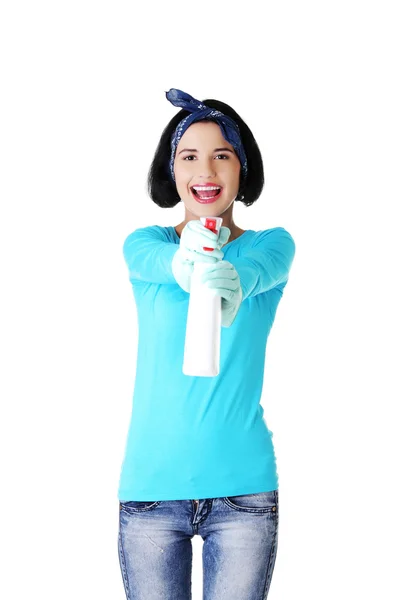 Portrait of happy woman with a cleaning fluid — Stock Photo, Image