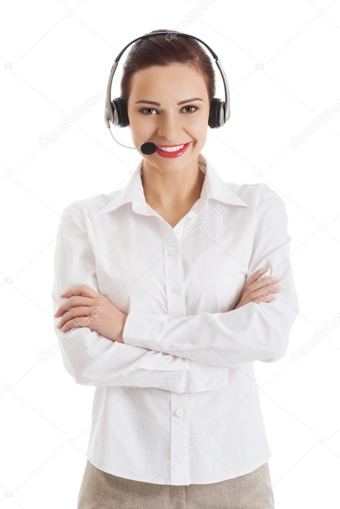 Smiling call center woman with folded arms