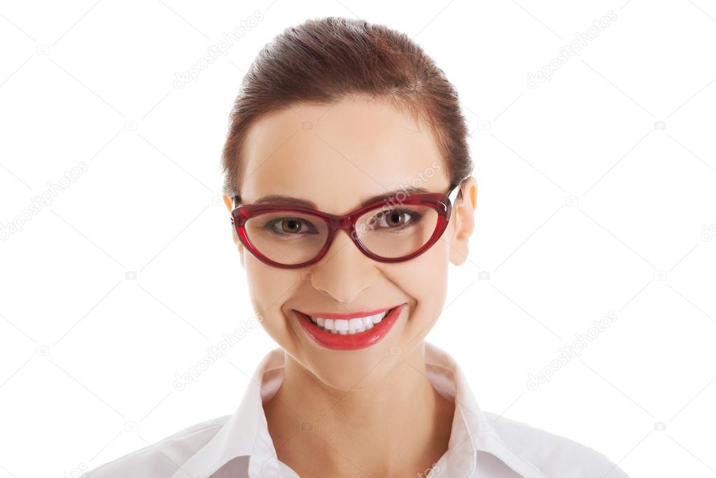 Portrait of young smiling businesswoman in eyewear