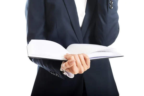 Close up on businesswoman holding her notes — Stock Photo, Image