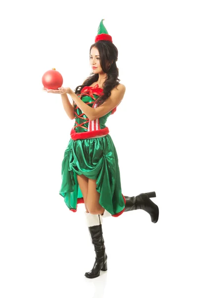 Woman holding red christmas bubble — Stock Photo, Image