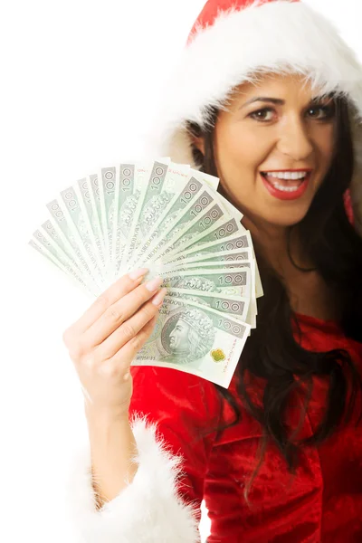 Santa mulher segurando um clipe de dinheiro polonês — Fotografia de Stock