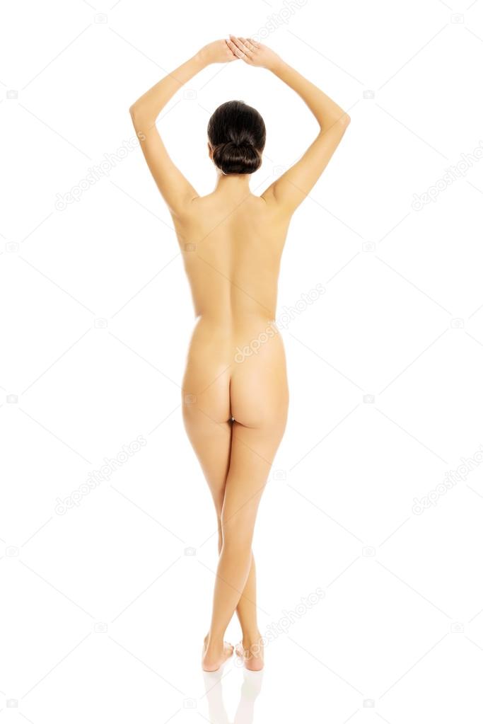 Back view nude woman crossing arms above head