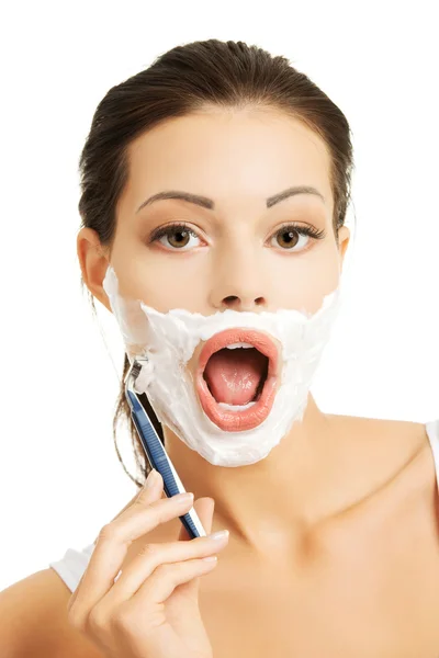 Boldog asszony arcát borotválkozás — Stock Fotó
