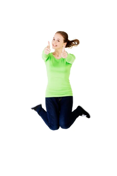 Happy laughing woman jumping for joy — Stock Photo, Image