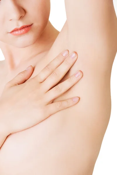 Close up on woman touching an armpit — Stock Photo, Image