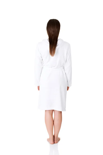 Back view woman standing, wearing bathrobe — Stock Photo, Image