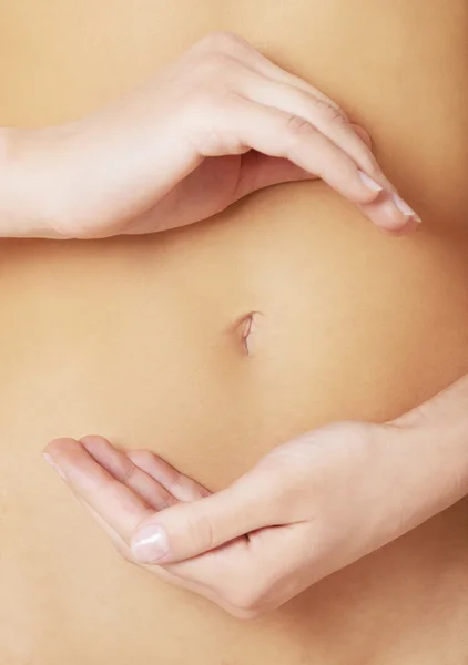 Close up on woman slim belly — Stock Photo, Image