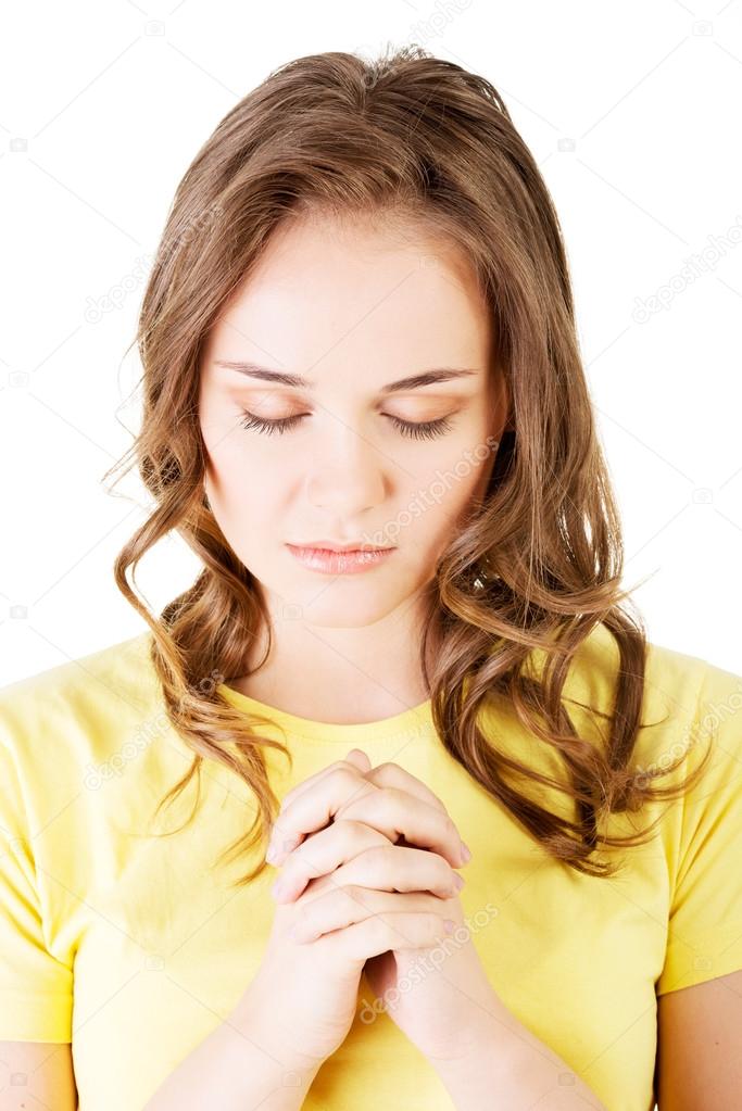 Portrait of a woman praying