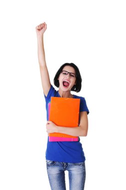 Genç başarılı öğrenci notlarını tutan