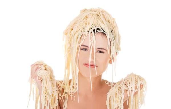 Portrait of a woman with pasta on head — Stock Photo, Image