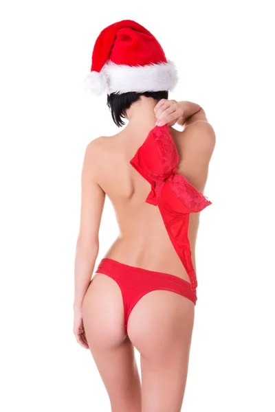 Back view woman with santa hat holding bra — Stock Photo, Image