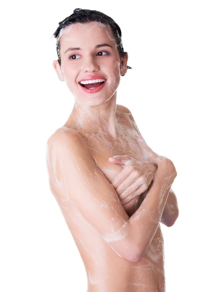 Retrato de jovem mulher sexy com espuma de sabão — Fotografia de Stock