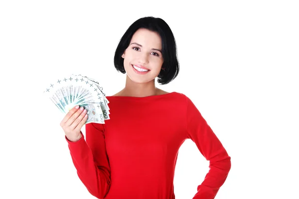 Šťastná žena drží polské bankovky — Stock fotografie