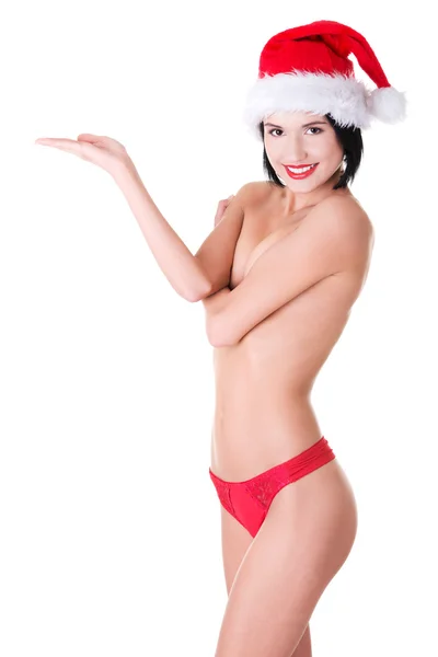 Woman with santa hat holding a copyspace Royalty Free Stock Images