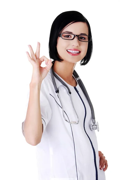 Female doctor showing OK sign — Stock Photo, Image