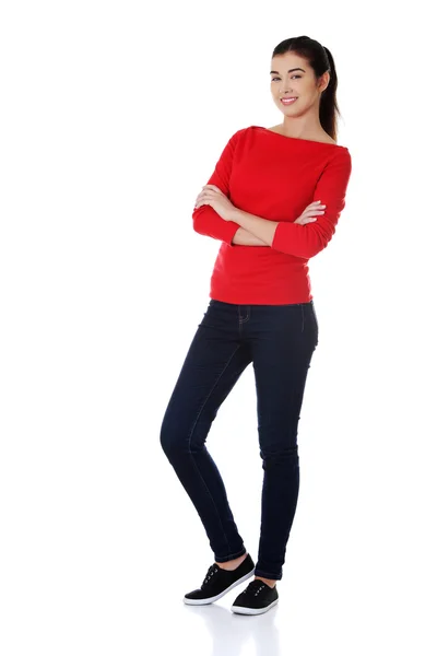Full längd kvinna poserar med korslagda armar — Stockfoto