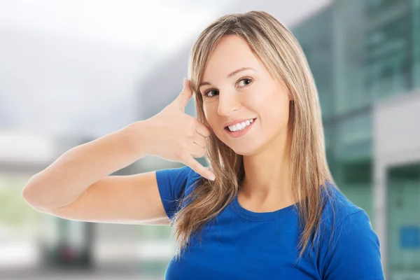 Woman making phone gesture — Stock Photo, Image