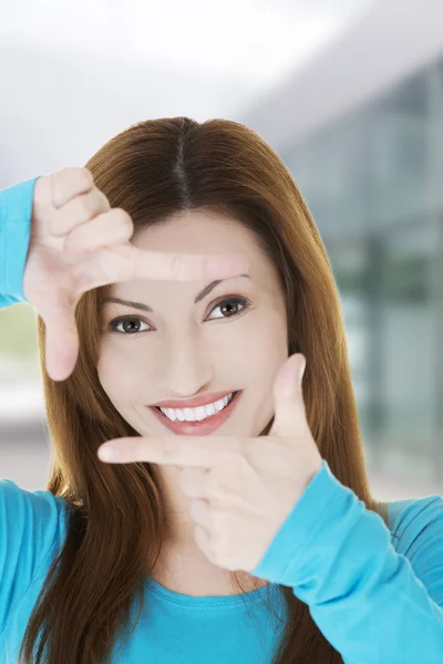 Woman gesturing frame sign — Stock Photo, Image