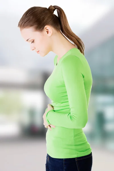 Young woman with stomach issues — Stock Photo, Image