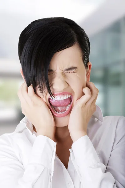 Benadrukt of boos zakenvrouw schreeuwen — Stockfoto