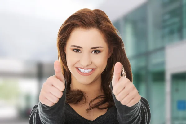 Happy woman with thumbs up — Stock Photo, Image