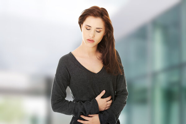 Woman with stomach issues