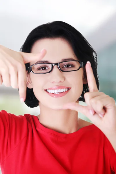 Woman gesturing frame sign — Stock Photo, Image