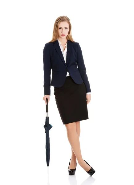 Бізнес-леді тримає парасольку — стокове фото