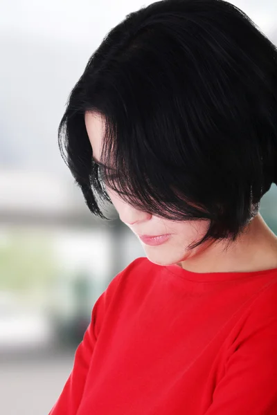 Portrait of a thoughtful woman — Stock Photo, Image