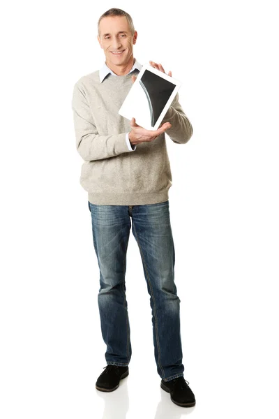 Mature man holding digital tablet — Stock Photo, Image