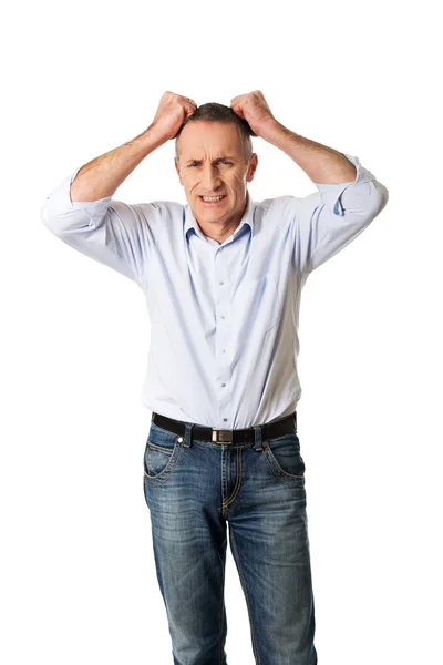 Uomo frustrato tirando i capelli — Foto Stock