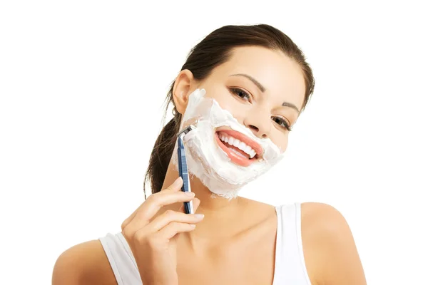 Portrait of happy woman shaving beard — Stock Photo, Image
