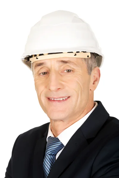 Smiling businessman with hard hat — Stock Photo, Image