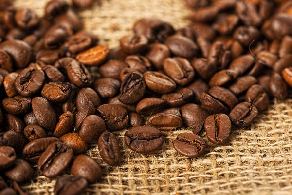 Coffee beans in a sack — Stock Photo, Image