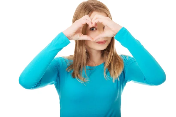 Woman making heart shape — Stock Photo, Image