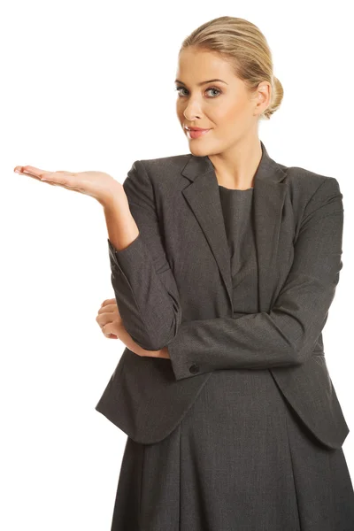 Businesswoman presenting copy space — Stock Photo, Image