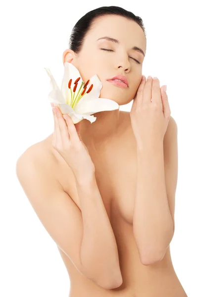 Nude woman with lily flower — Stock Photo, Image