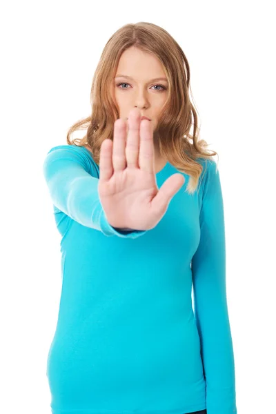Woman making stop gesture Royalty Free Stock Images
