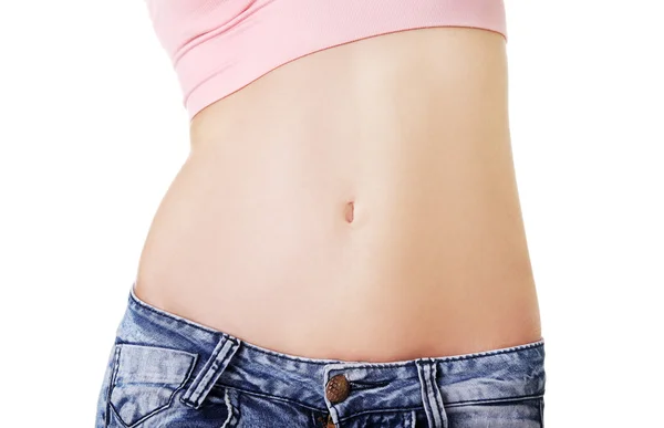 Woman showing flat belly — Stock Photo, Image