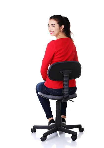 Student woman sitting on armchair — Stock Photo, Image