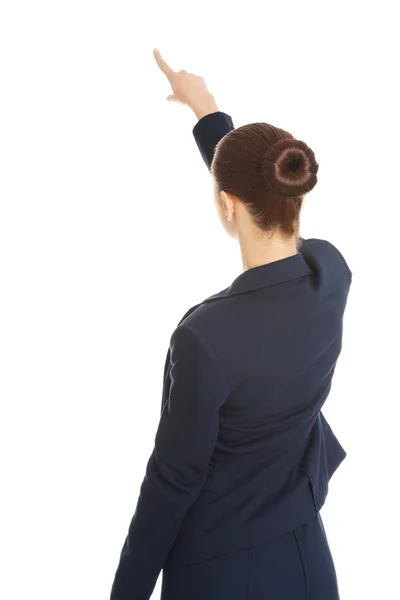 Femme d'affaires pointant sur l'espace de copie . — Photo